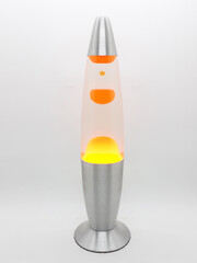 Clean Beautiful Metallic Orange Lava Lamp for Interior Home Decoration in White Isolated Background