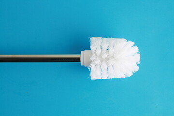 toilet brush in white and silver