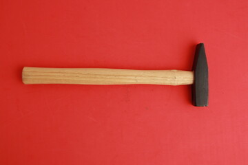 The claw hammer in colorful background