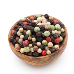 Pepper mix seed on spoon on white background.