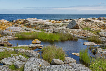 Coast line of Baltic Sea near the village of Svaneke on Island Bornholm in Denmark