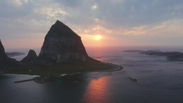 Aerial view above sunset sea rocks Traena islands travel in Norway beautiful destinations amazing landscape nature Helgeland tranquil scenery