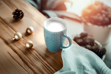 ot drink in cup on wooden table and blurred background of window. Free space for your decoration and small plants. Home interior and copy space. 