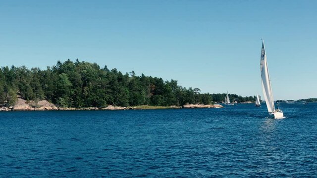 Sloop Boat Exploring Stockholm Archipelago In a Sunny Day