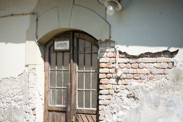old door with old bricks wall