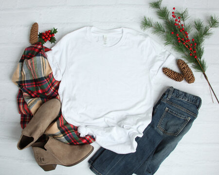 Mockup Flat Lay of blank white t shirt on with Christmas accessories