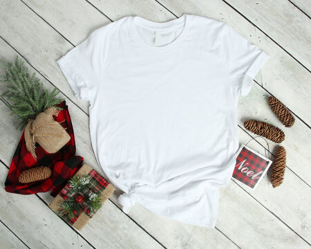 Mockup of a White T-Shirt Blank Shirt Template Photo with Christmas accessories