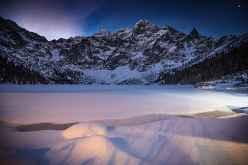 Morskie Oko in winter sunrise in Tatra Mountains in Poland © PawelUchorczak