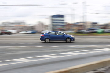 Fototapeta na wymiar blue car on the road