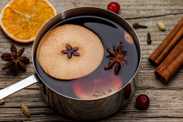 Mulled wine in a metal bowl