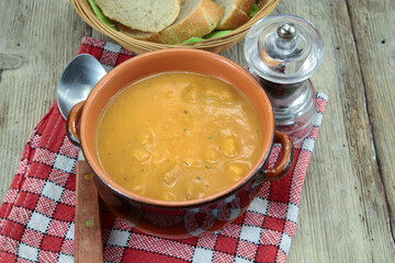 bowl of soup with vegetables and croutons