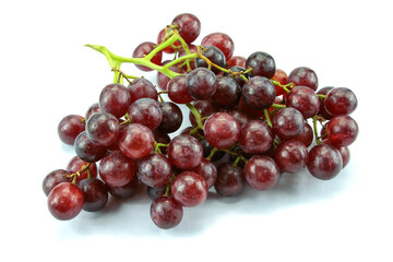 bunch of black grapes on a white background