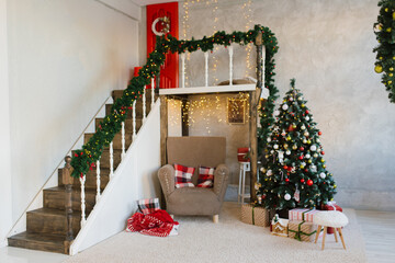 Traditional living room with a Christmas tree in red and white colors