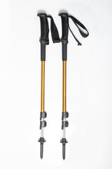A pair of hiking or trekking poles sticks isolated on white background
