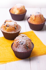 Handmade muffins on a wooden table
