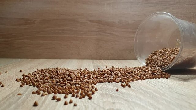 Buckwheat. Buckwheat kernels. Buckwheat close-up. Dietary grits.