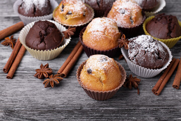 Handmade muffins close up on a black wooden table