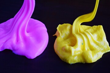 Beautiful slime on black background.Funny children's toy.