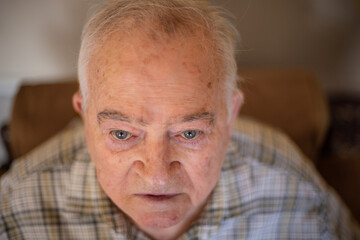 Portrait of an elderly man with thankful