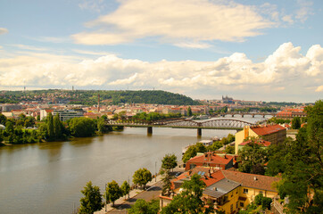 Fototapeta na wymiar View of the river and bridge in Prague