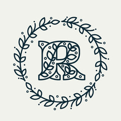 R letter logo consisting of floral pattern in a circle laurel wreath. Linear heraldic vector font.