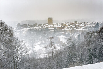 Fototapeta na wymiar Snow falling on Richmond North Yorkshire, including Richmond Castle