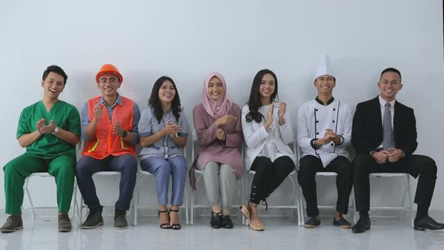 Concept with various professions with free space. clapping their hands. applause