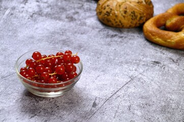 cranberries in a bowl on wooden table