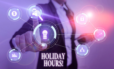 Text sign showing Holiday Hours. Business photo text Overtime work on for employees under flexible work schedules Woman wear formal work suit presenting presentation using smart device