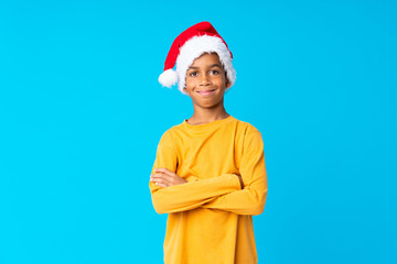African American boy with christmas hat smiling a lot