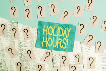 Handwriting text writing Holiday Hours. Conceptual photo Overtime work on for employees under...