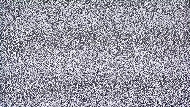 Blinking tv noise motion texture, real classic television set Bad tv signal noise interference screen the television. 