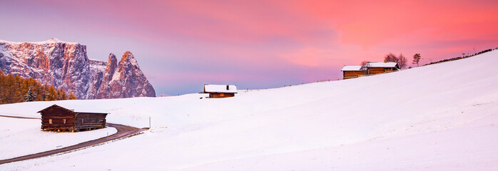 amazing winter landscape at sunrise in Alpe di Siusi. Dolomites  Italy - winter holidays destination