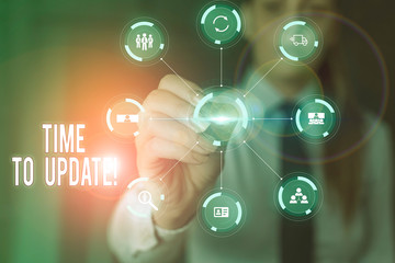 Conceptual hand writing showing Time To Update. Concept meaning this is right moment to make something more modern new Picture photo network scheme with modern smart device