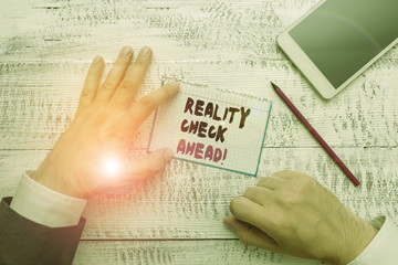 Conceptual hand writing showing Reality Check Ahead. Concept meaning makes them recognize truth...