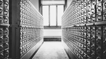 Library card catalog cabinets containing library cards