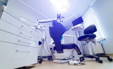 Brand new medical office. Advanced Dentist room with microscope. Stomatologist' professional equipment. Hi tech medical clinic. Dentist clinic. Modern dental office interior.