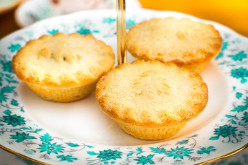 Christmas fruit mince pies served on a turquoise bone china serving plate