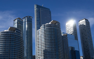 Fototapeta premium Toronto skyscrapers in front of deep blue sky.
