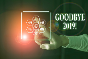 Word writing text Good Bye 2019. Business photo showcasing express good wishes when parting or at the end of last year Picture photo system network scheme modern technology smart device