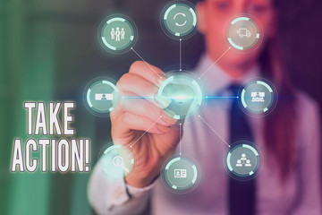 Conceptual hand writing showing Take Action. Concept meaning do something official or concerted to achieve aim with problem Picture photo network scheme with modern smart device
