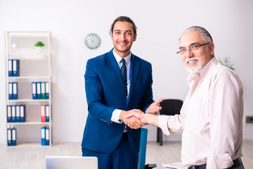 Financial advisor giving retirement advice to old man