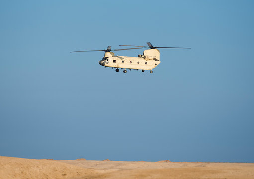 Military chinook helicopter in flight