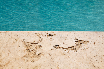 A natural stone. Facing tiles. Paving slabs. Granite. Marble. Crushed stone Texture. Terrace. The territory near the pool. Material. Limestone.