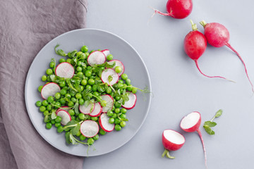fresh salad with radishes and peas for spring menu