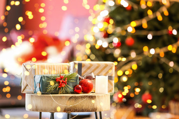 Beautiful Christmas gift boxes on table in room