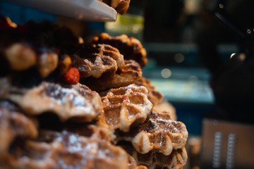 waffles with powdered sugar in the old town of sweden