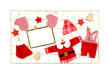 Obraz na płótnie Canvas Cute toy Santa clothers over the white background.