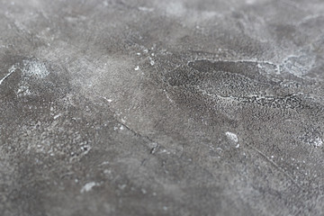 Texture of a grey stone background. Dark Cement and concrete texture, selective focus.