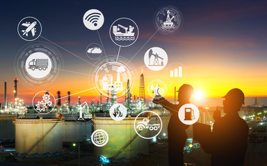 Engineering team is working at the oil and gas refinery factory zone in large energy industrial ,and physical system icons concept, Industry 4.0 concept at sunset. image